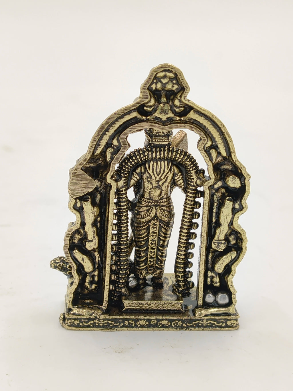Mini brass sculpture of Murgan deity with ornamental arch frame