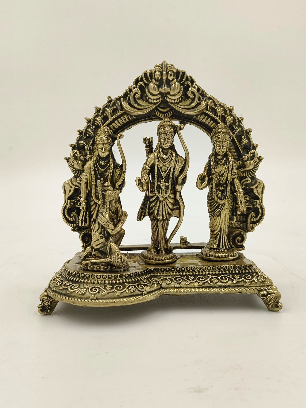 Small brass Ram Parivar sculpture with Rama, Sita, Lakshman, and Hanuman on ornate base