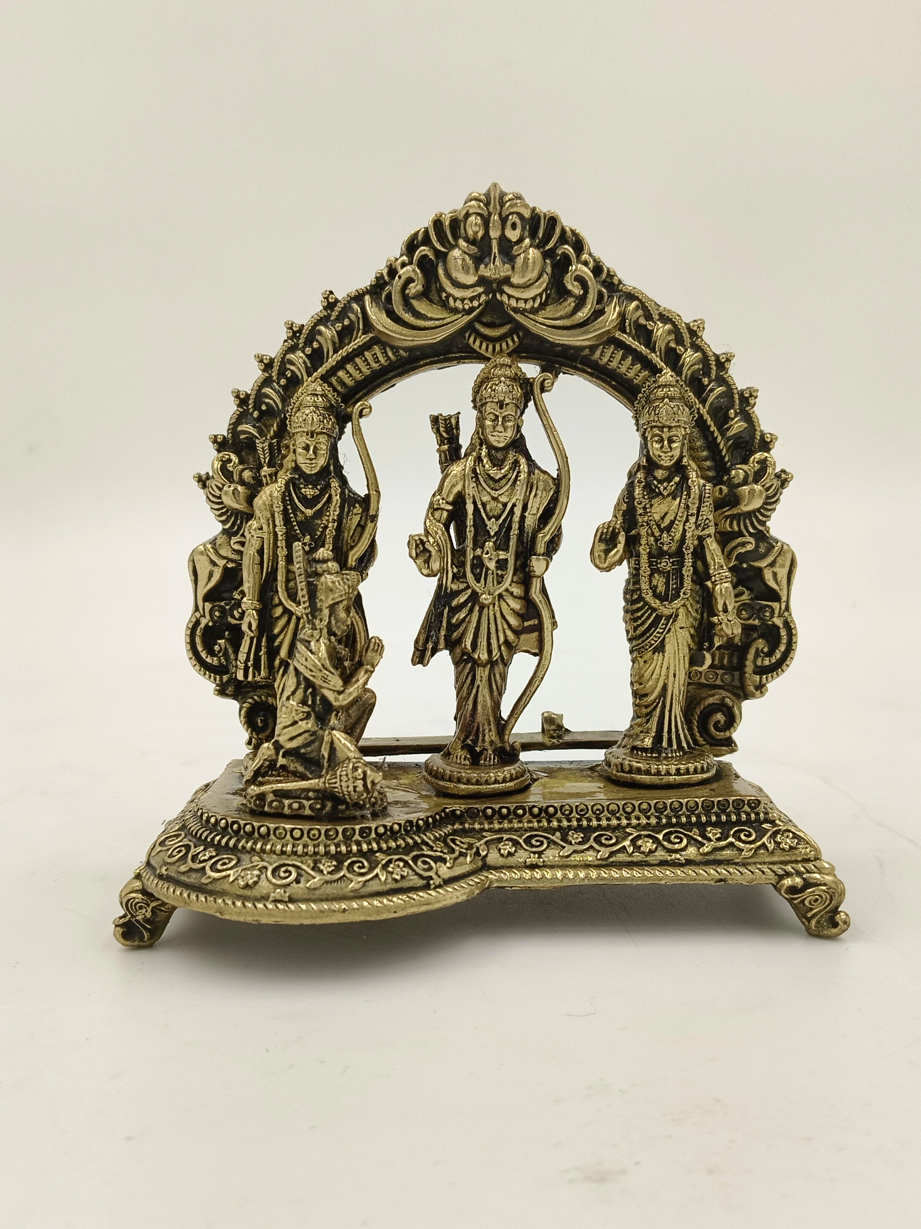 Small brass Ram Parivar sculpture with Rama, Sita, Lakshman, and Hanuman on ornate base