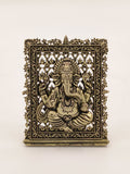 Small brass Ganesh panel with intricate decorative border and detailing