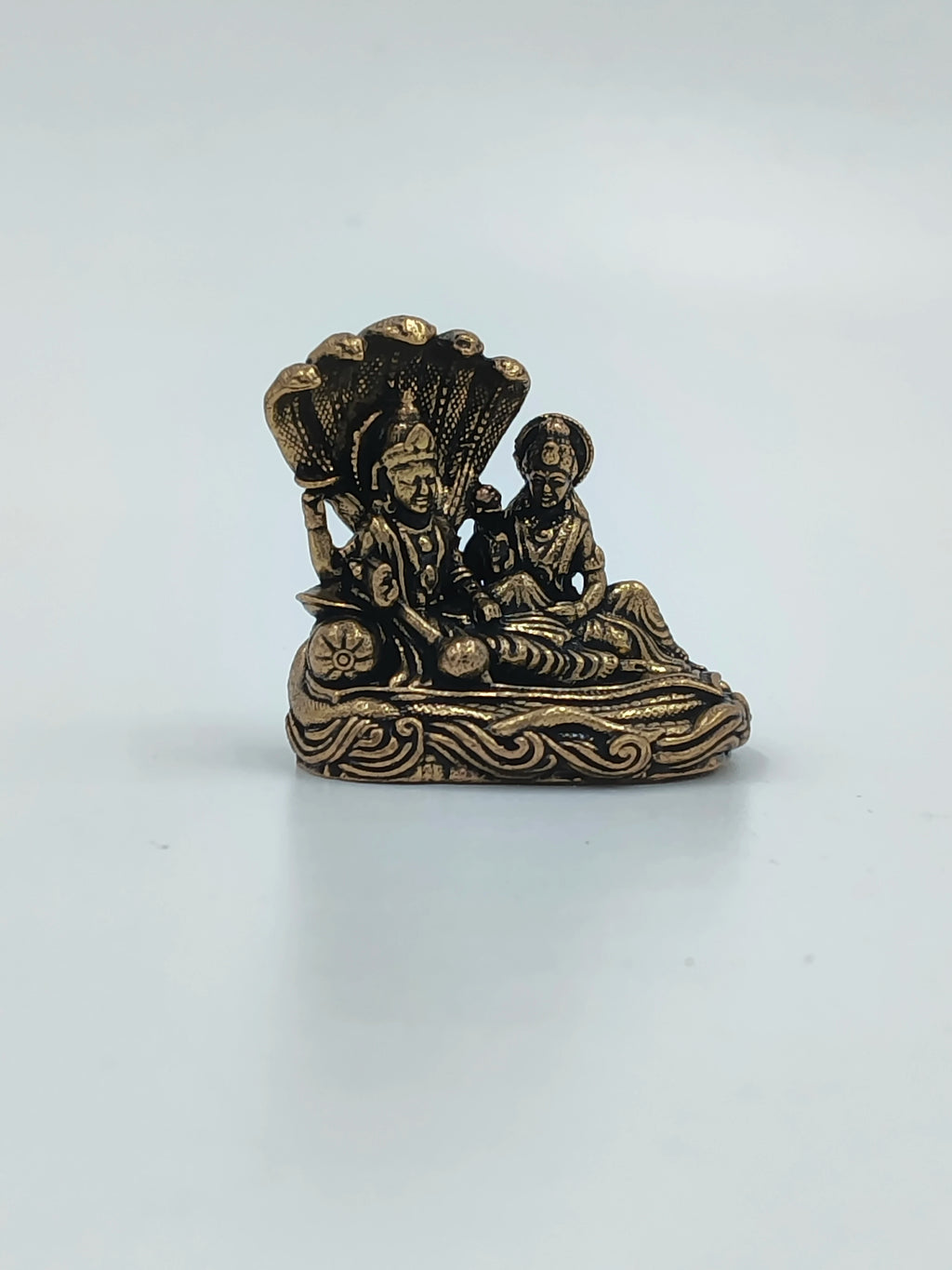 Brass small Vishnu Lakshmi sculpture in a compact size with detailed design