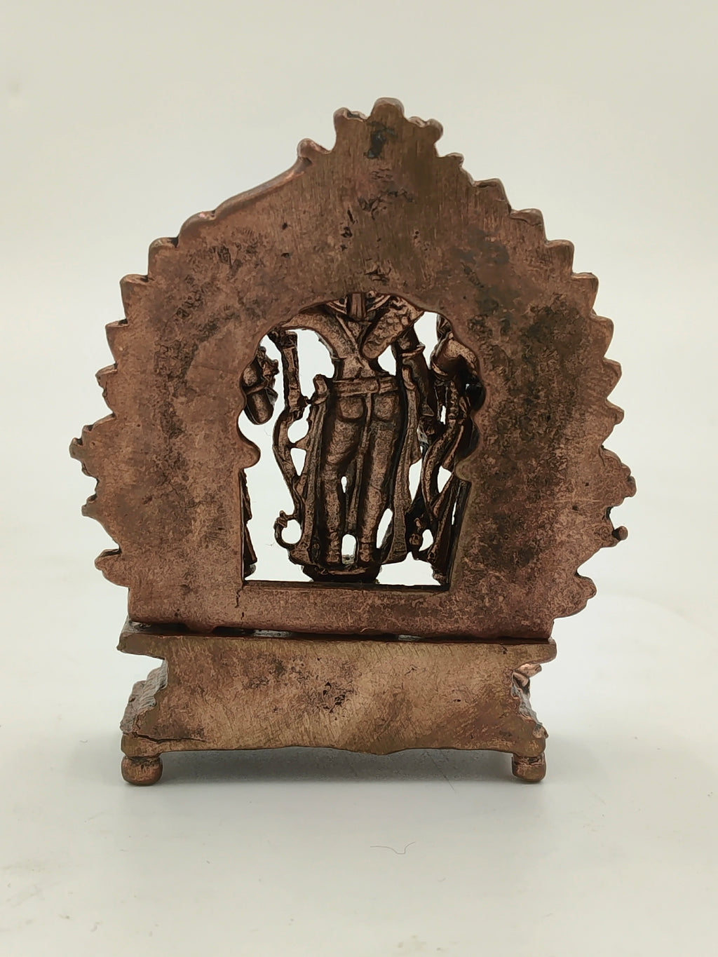 Back view of small copper Ram Parivar brass sculpture with intricate detailing