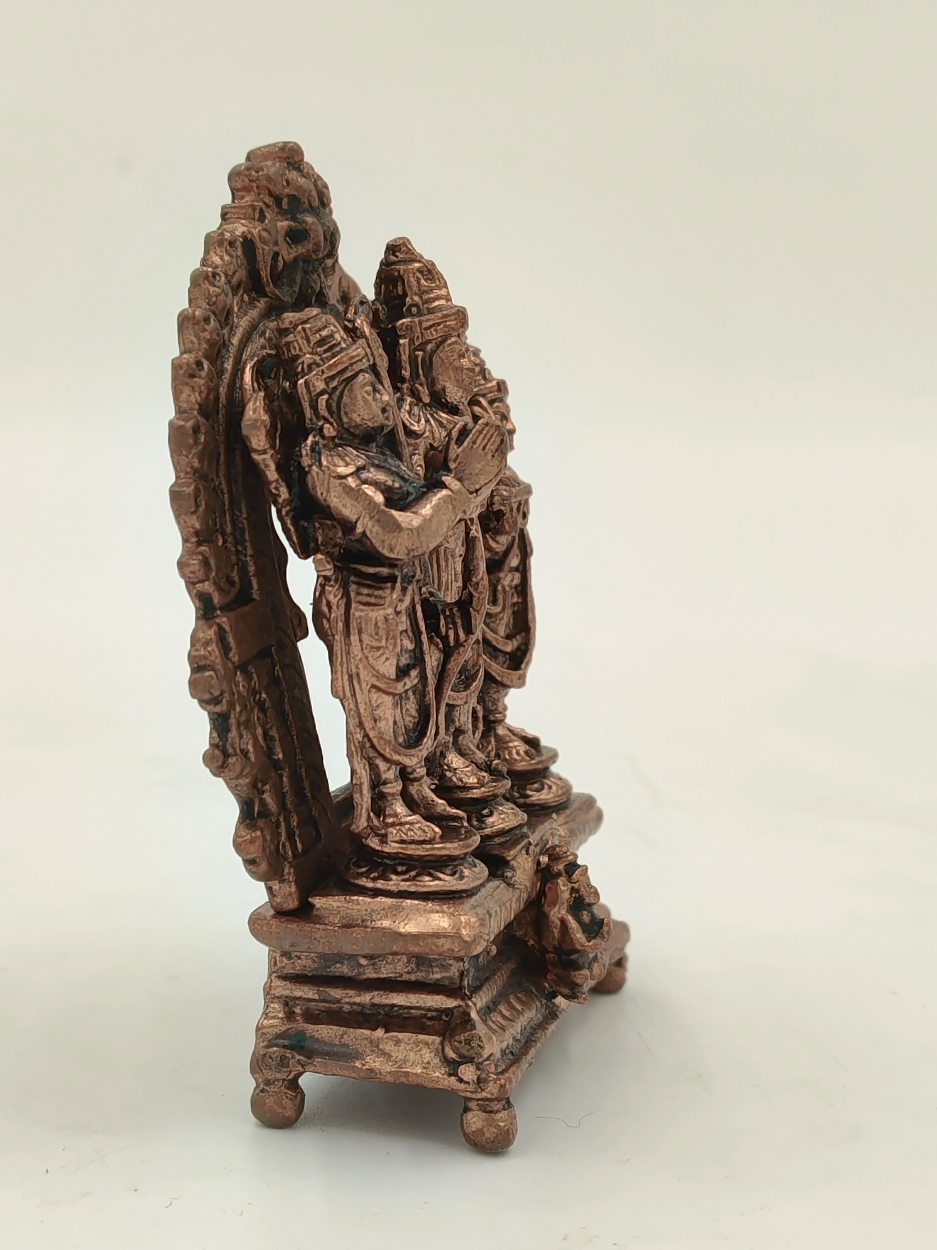 Small brass Copper Ram Parivar sculpture with detailed figures on a decorative base