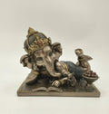 Medium polyresin sculpture of playful Baby Ganesh reclining with a mouse and sweets