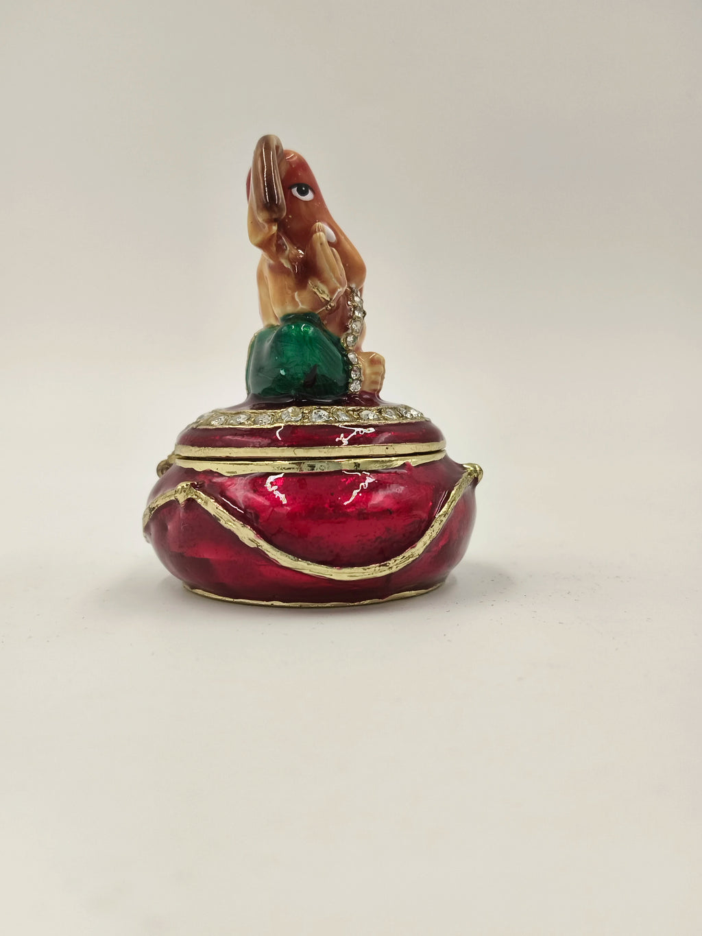 Mini brass enamel box with Ganesh figurine on lid, red and green colors