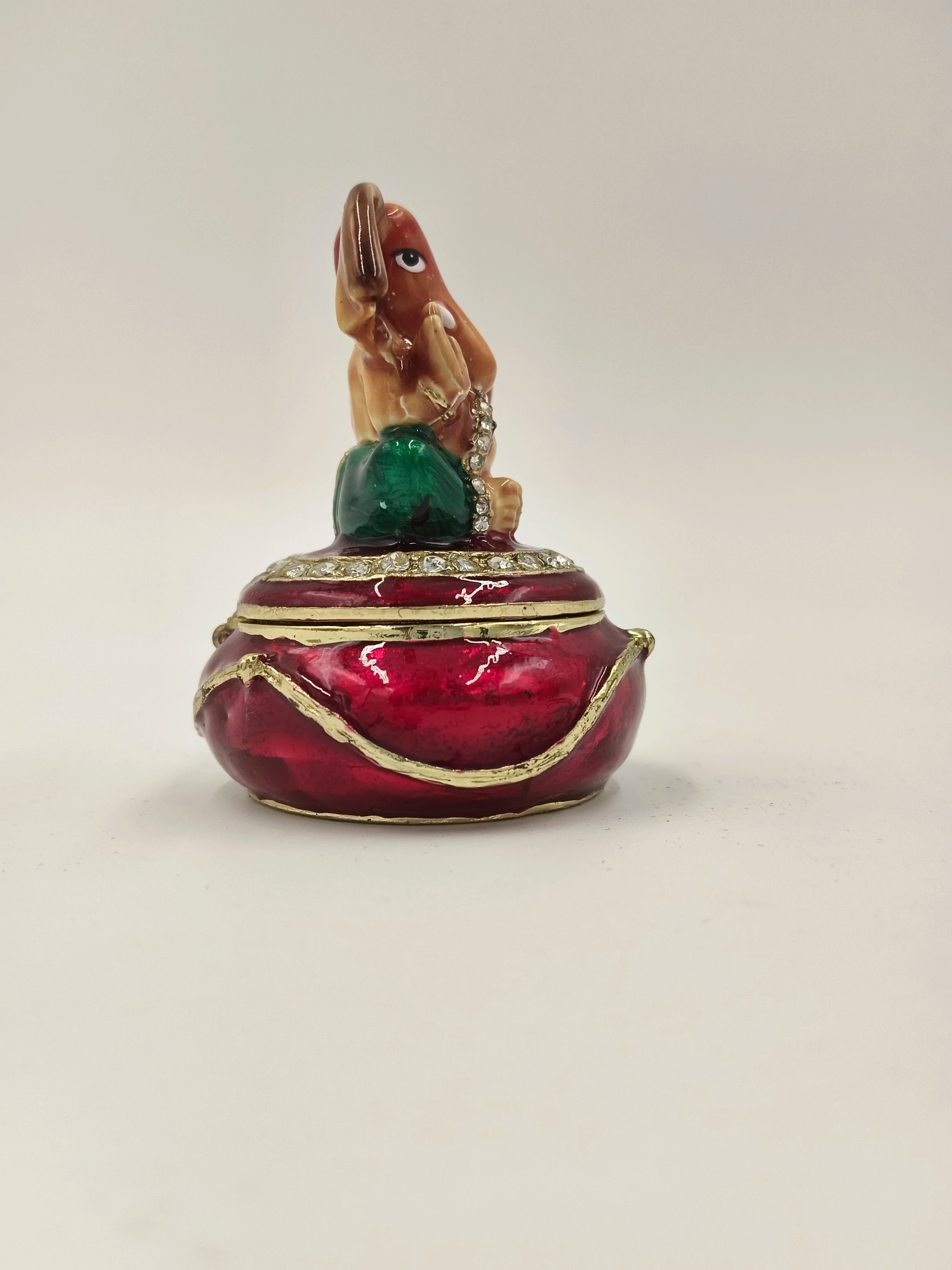 Mini brass enamel box with Ganesh figurine on lid, red and green colors
