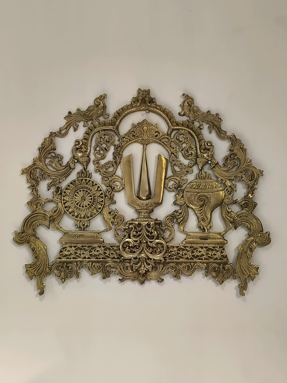 Large brass Shankh chakra Tilak wall frame with intricate carvings
