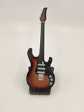 Large wooden guitar sculpture with sunburst finish on stand