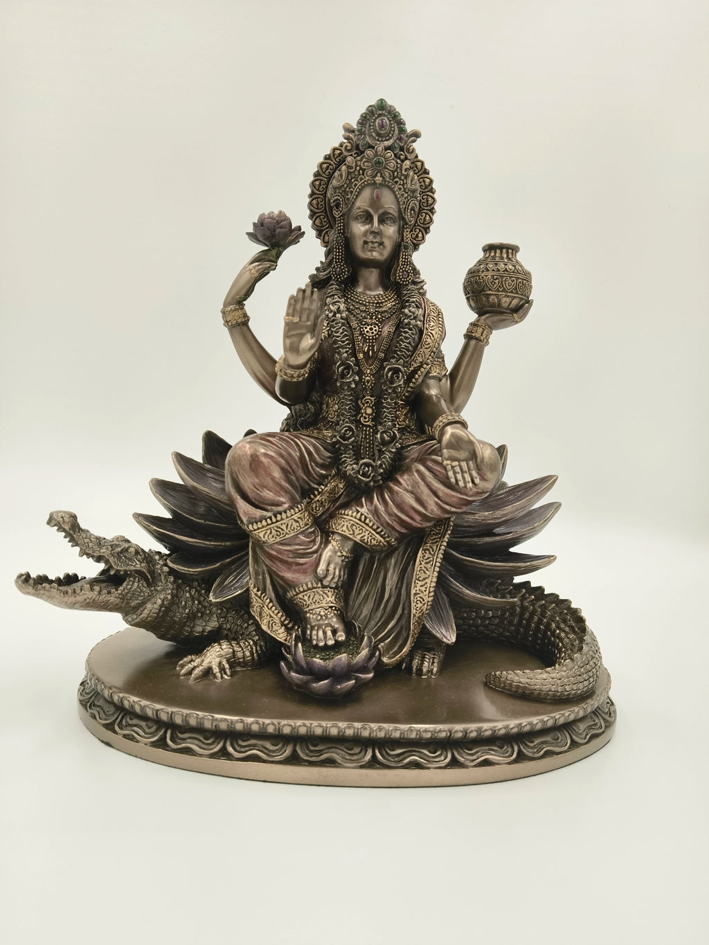 Large polyresin statue of goddess Ganga Devi seated on a crocodile with lotus and pot