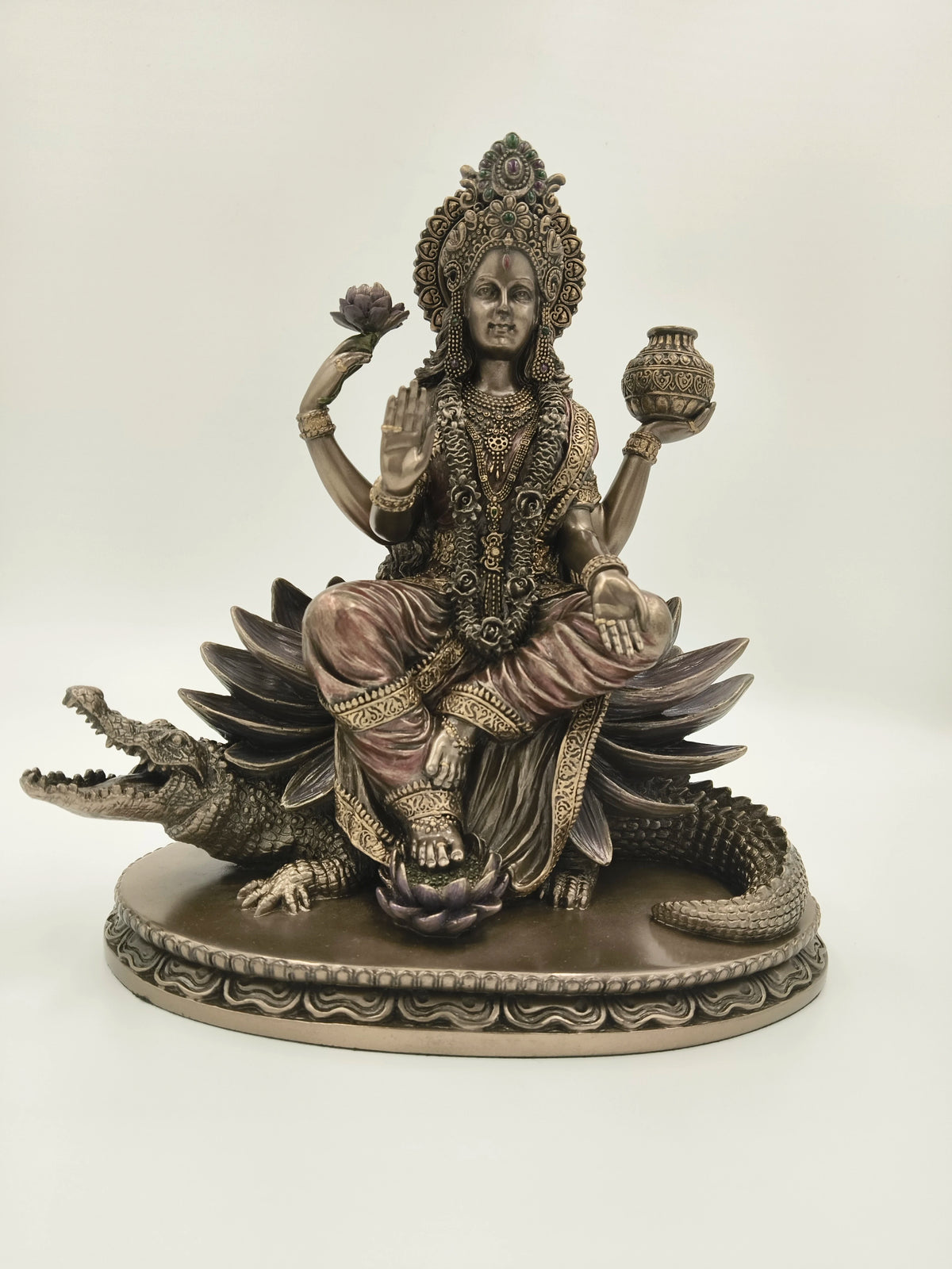 Large polyresin statue of goddess Ganga Devi seated on a crocodile with lotus and pot