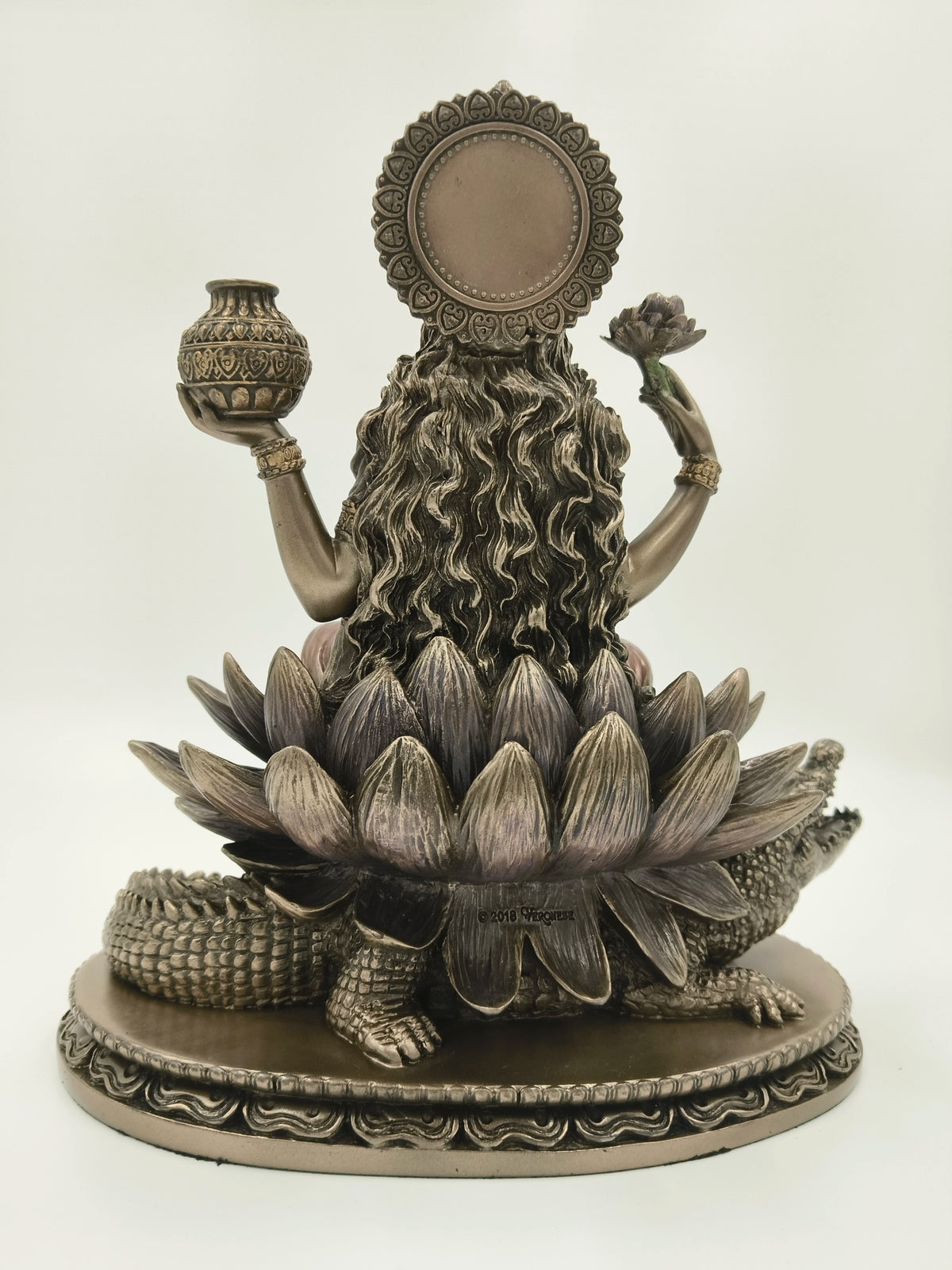 Back view of large polyresin Ganga Devi statue seated on a lotus with crocodile base