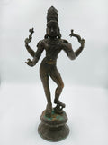 Large bronze statue of standing Shiva with four arms on a decorative base