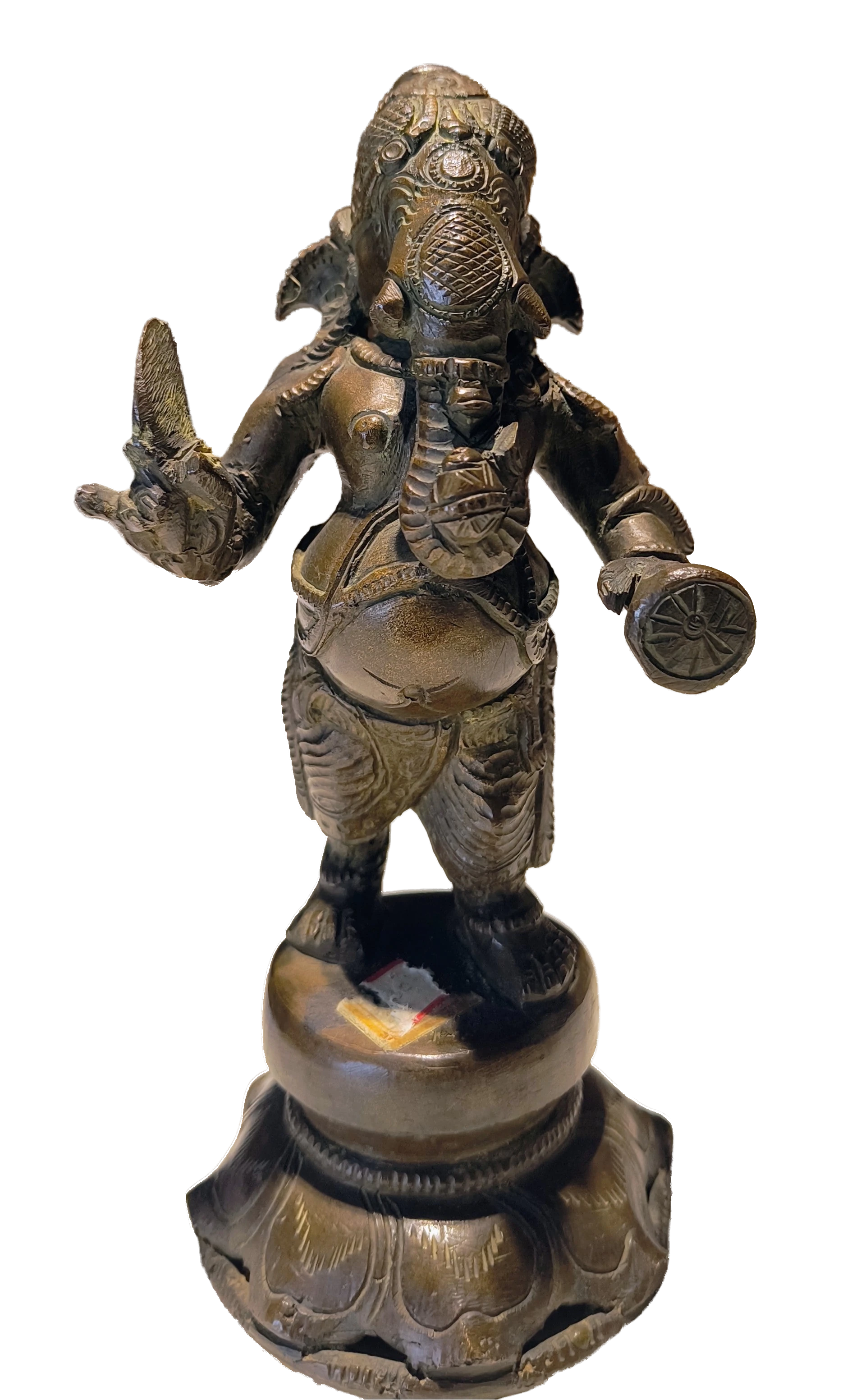 Bronze statue of Ganesh standing on a decorated pedestal, front view