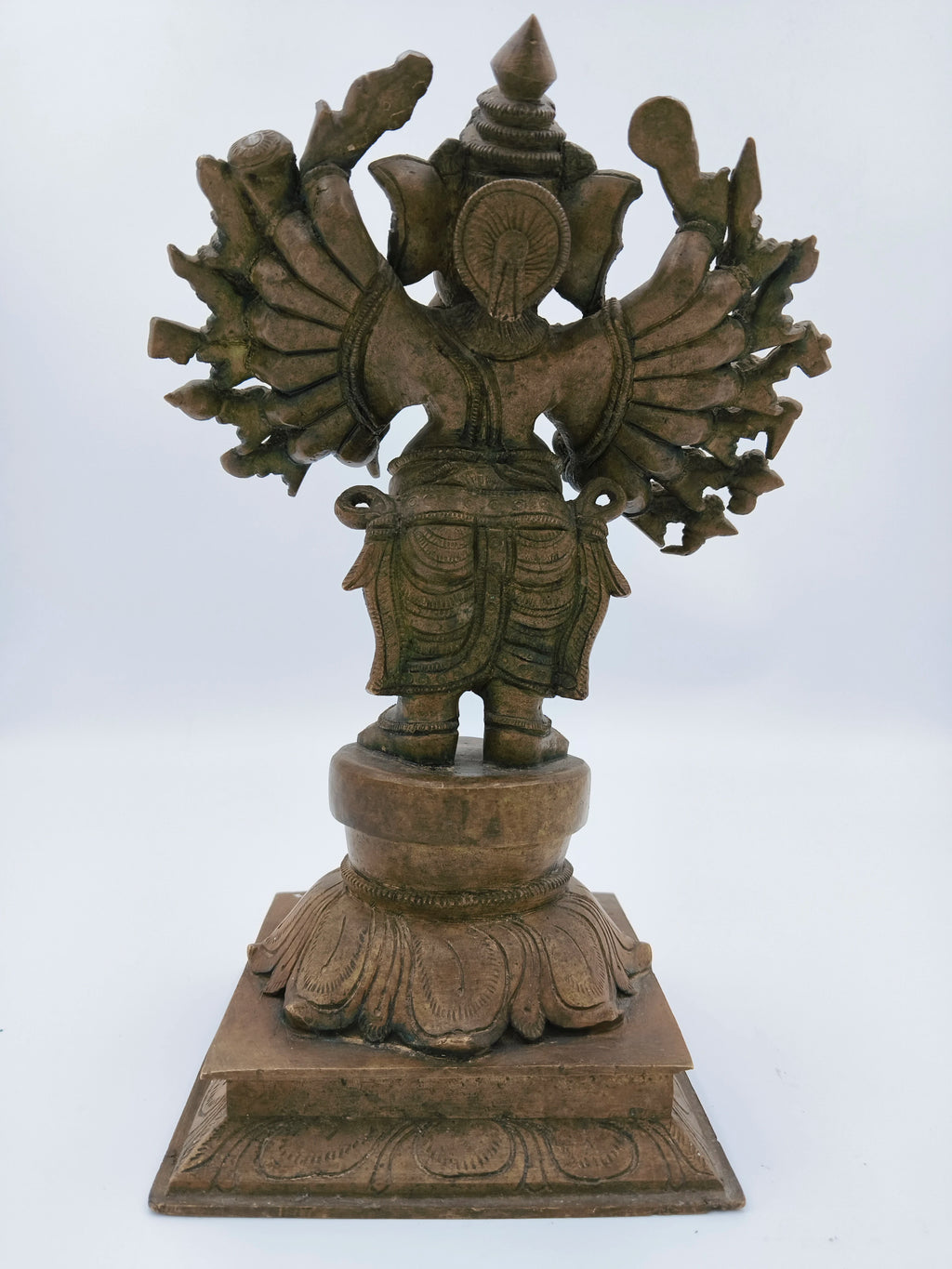 Back view of large bronze Ganesh sculpture with detailed carvings
