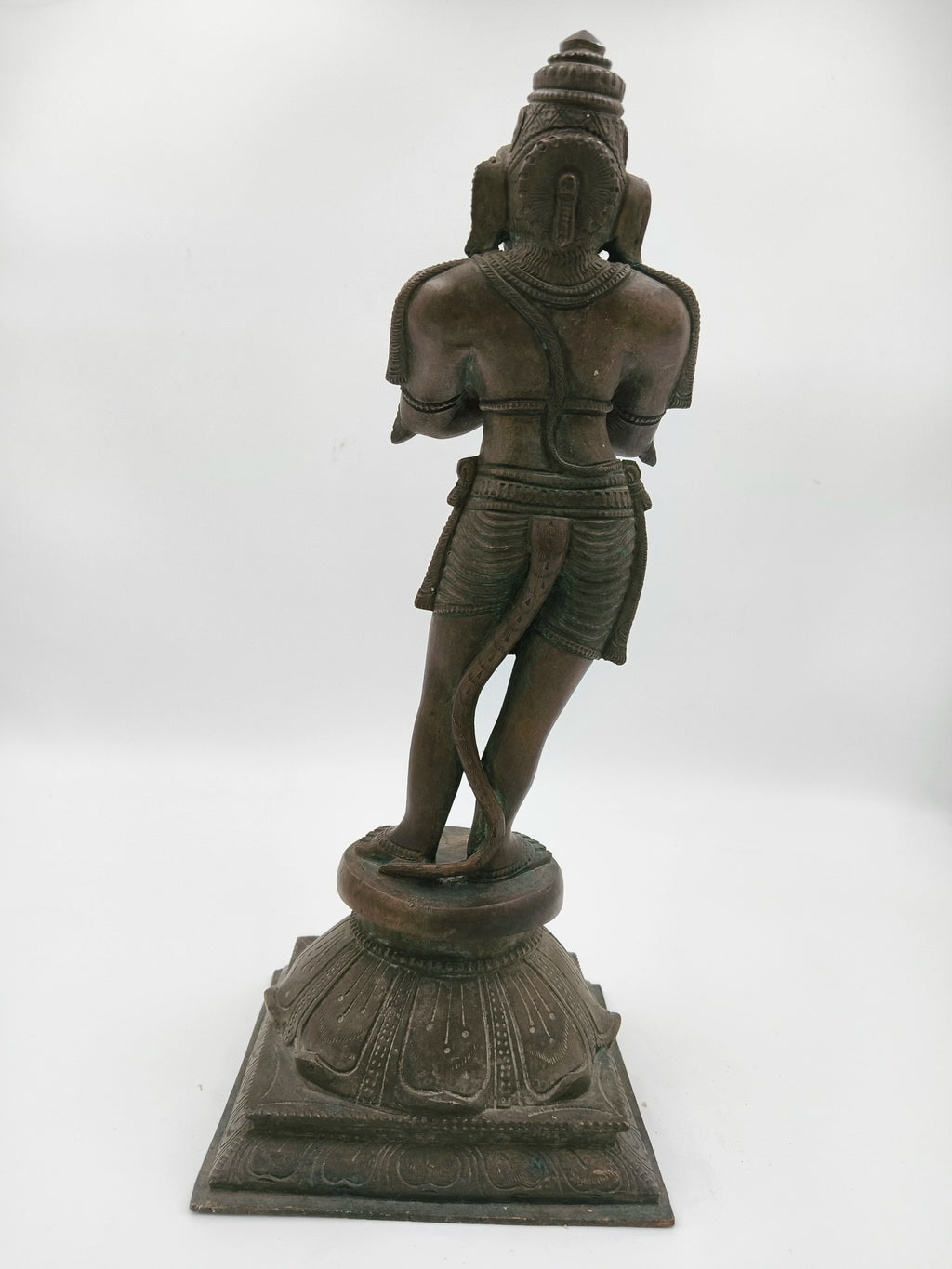 Back view of 12.2-inch bronze Hanuman sculpture with Namaskaram pose on decorated base