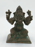 Front view of a medium-sized bronze Ganesh statue seated on a decorative base