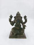 Front view of a 4.7 inch bronze Ganesh statue seated on a square base