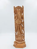 Large sandalwood Ganesh idol sculpture on wooden pedestal, front view