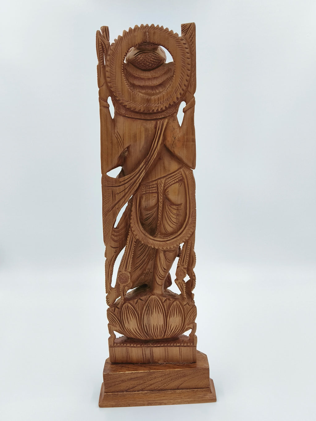 Large sandalwood Ganesh idol sculpture with detailed carvings on lotus base