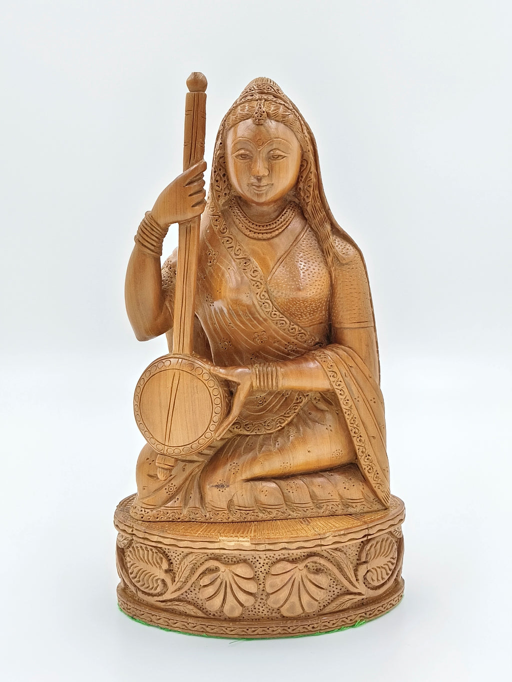 Large sandalwood Meera Bhai idol playing musical instrument, seated posture