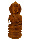 Sandalwood Buddha statue seated in lotus position with right hand raised
