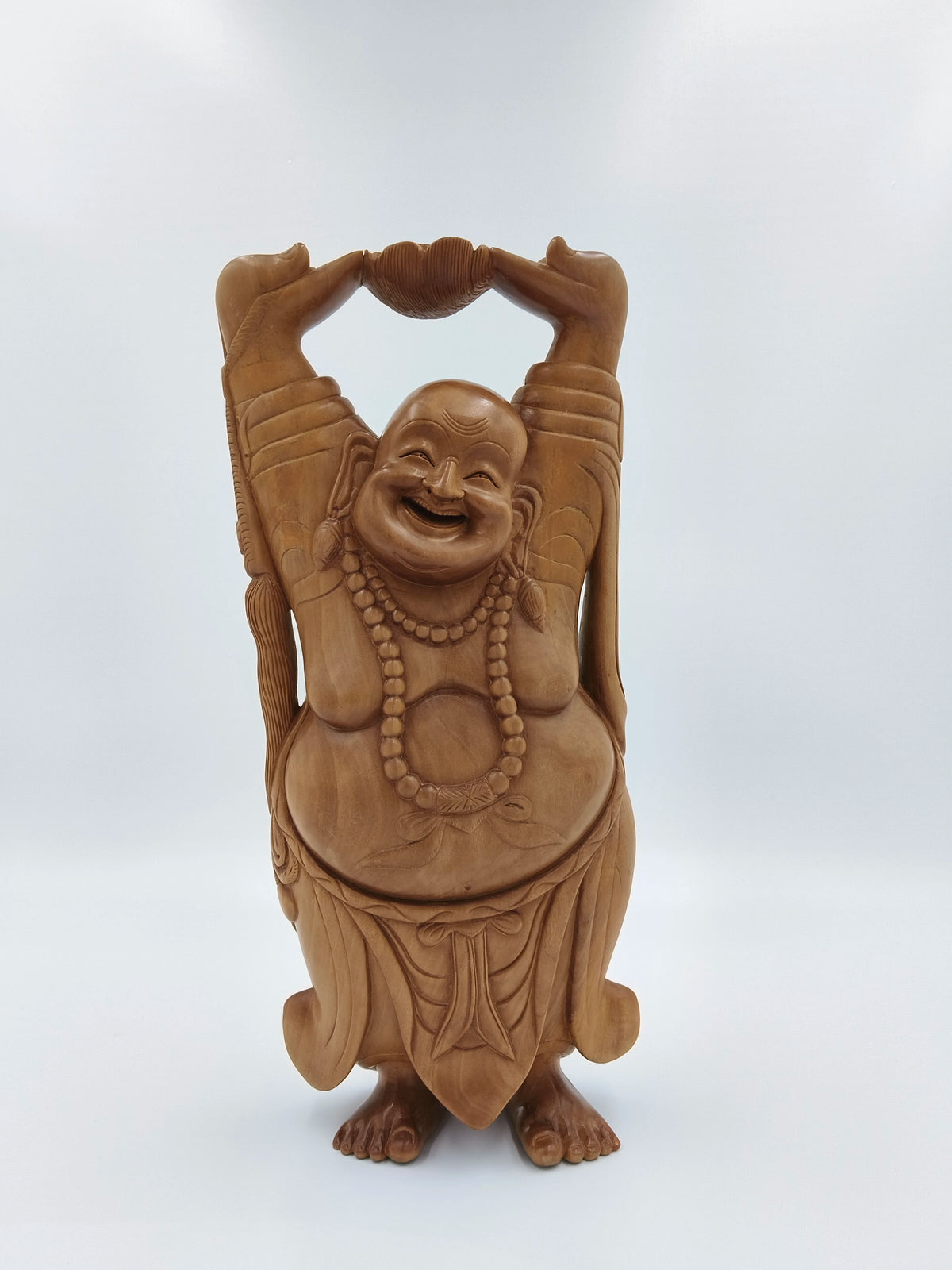 Large sandalwood Laughing Buddha idol with arms raised holding a bowl