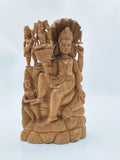 Large sandalwood idol of Vishnu seated on serpent with detailed carvings