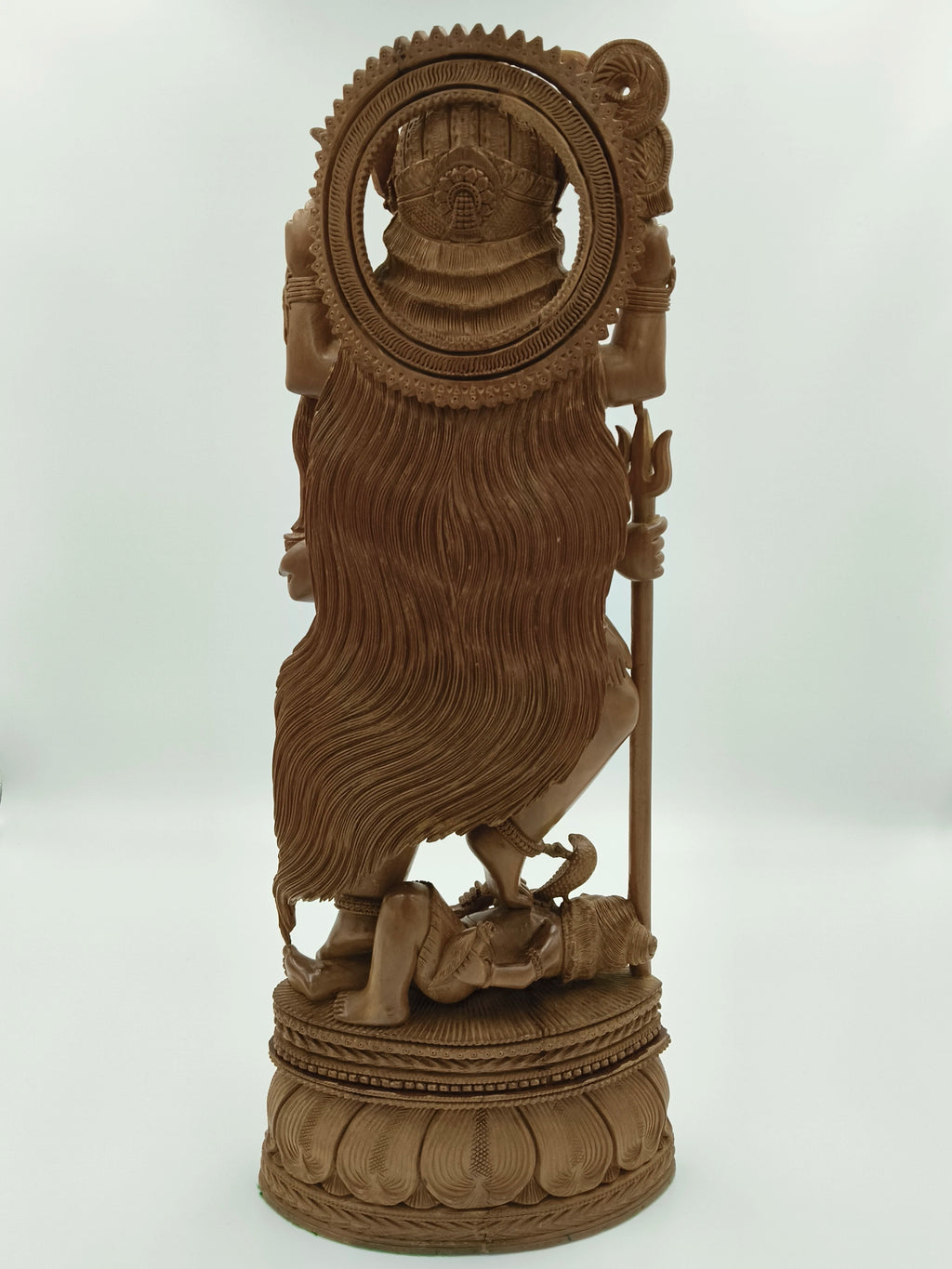 Back view of large sandalwood Kalikamatha sculpture with detailed carving