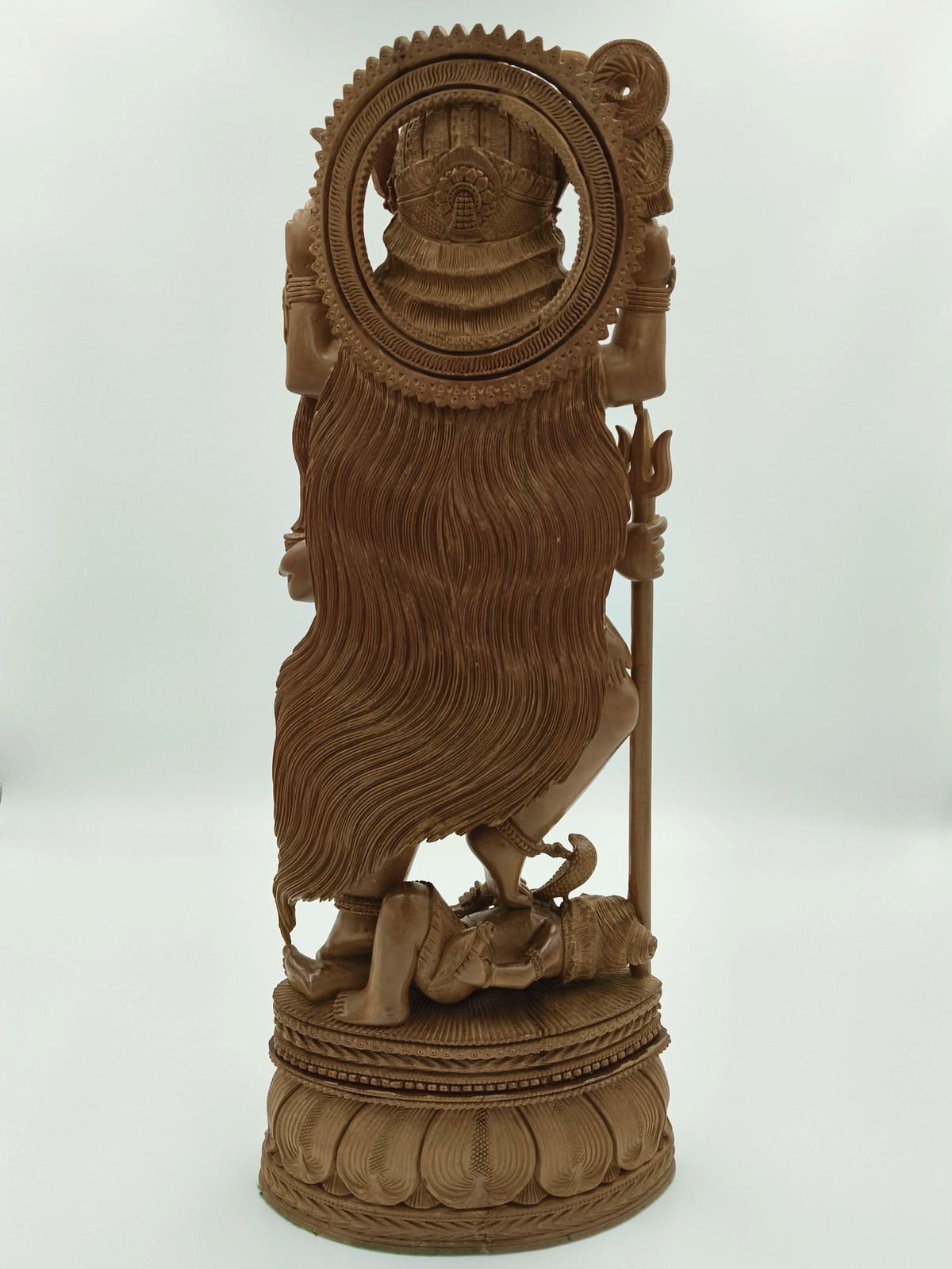 Back view of large sandalwood Kalikamatha sculpture with detailed carving
