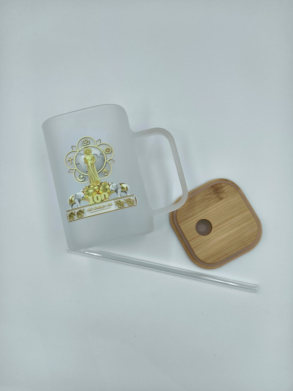 Frosted glass mug with Sri Sathya Sai centenary logo, bamboo lid, and glass straw