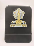 Black wooden board featuring Sri Sathya Sai Baba golden statue and centenary celebration emblem