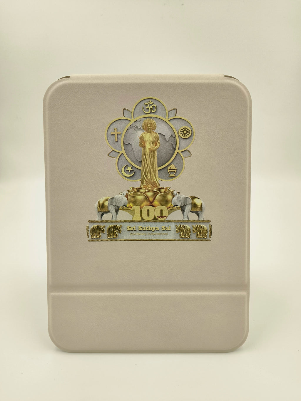 white board featuring Sri Sathya Sai Baba centenary celebration logo with gold and silver details