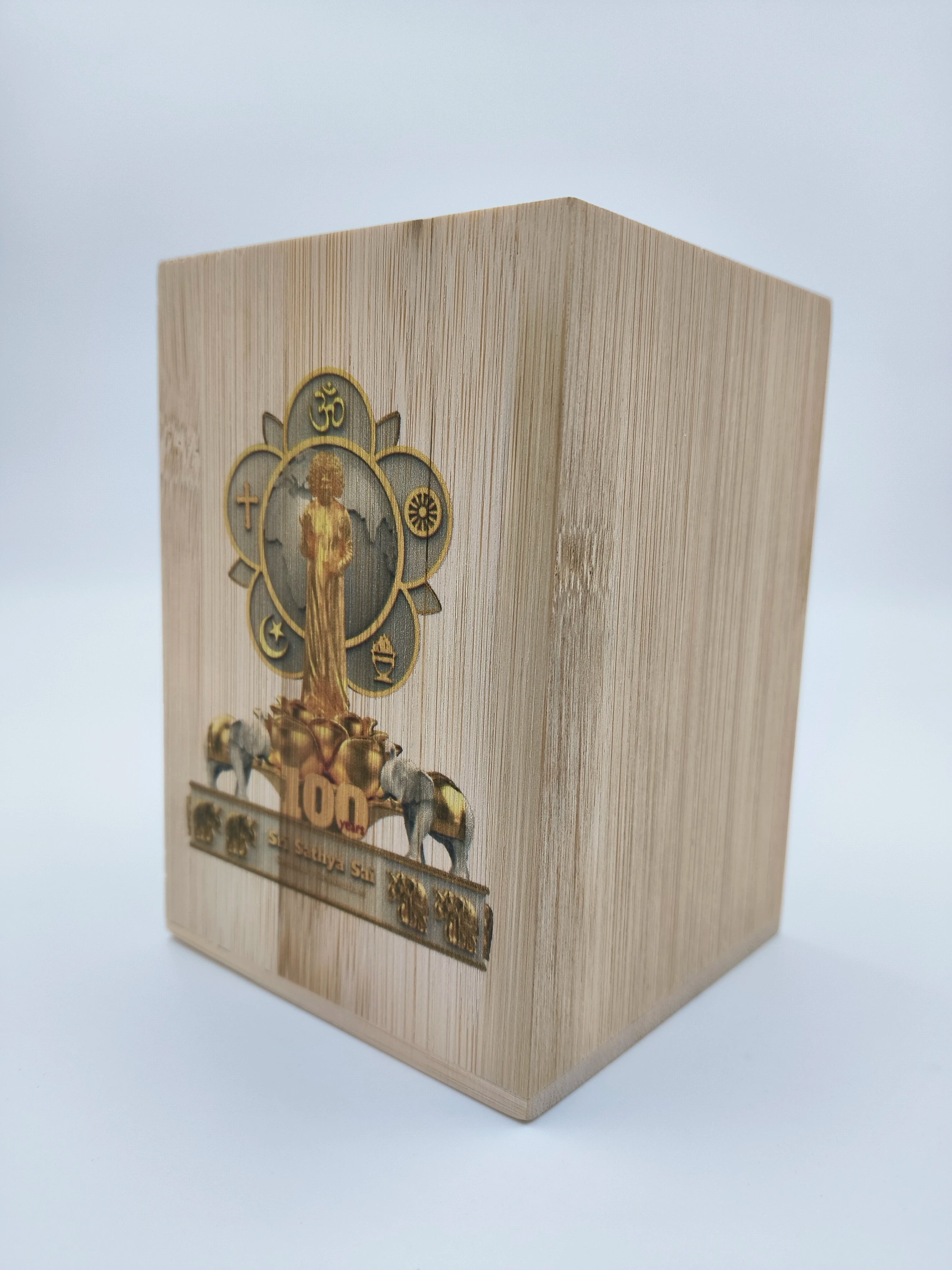 Wooden pen stand with Sri Sathya Sai Centenary Celebrations logo and elephant design