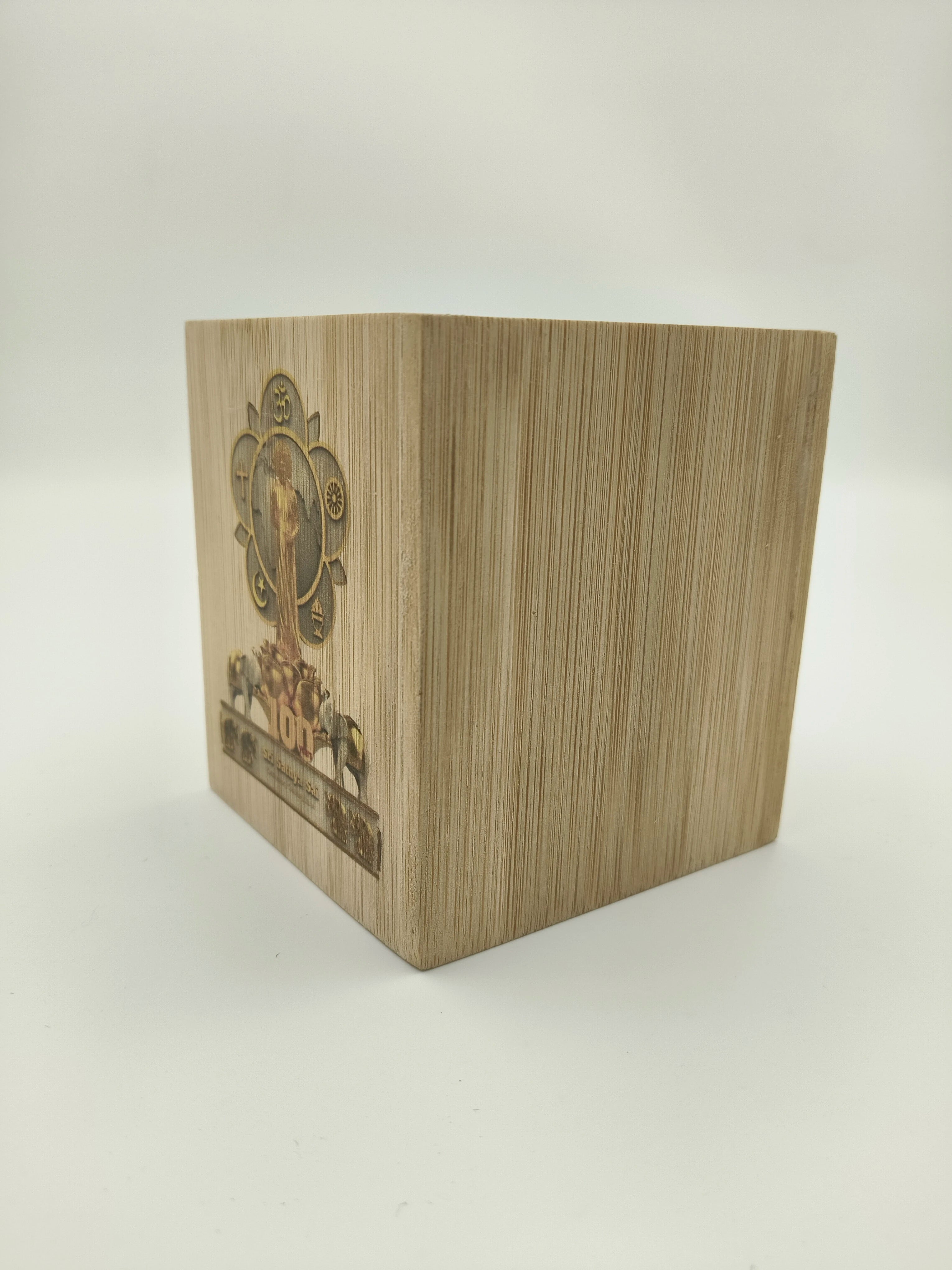 Small wooden pen stand with Sri Sathya Sai centenary celebrations logo