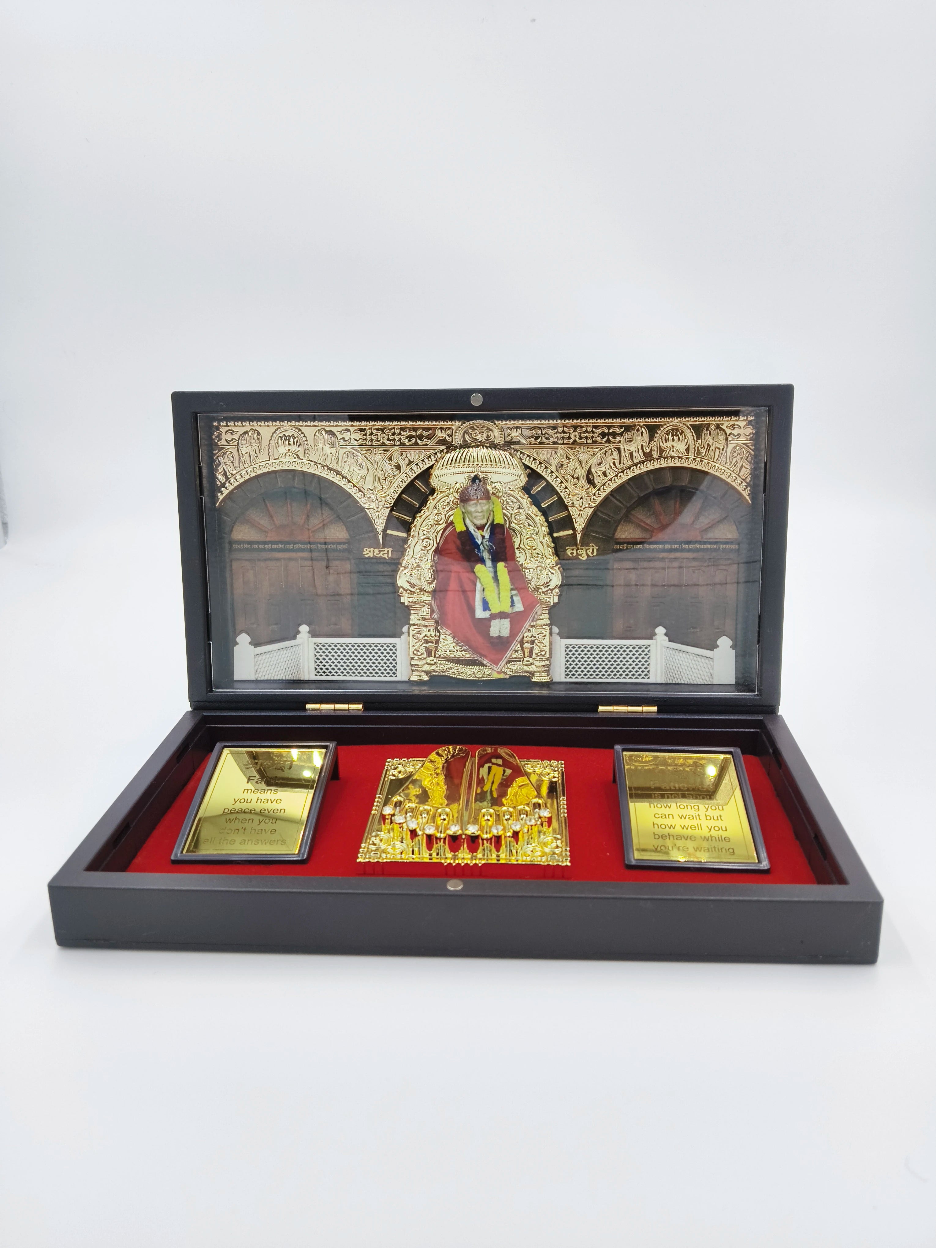 Sri Shirdi Sai Baba Paduka gold-colored religious box with figurines and framed quotes