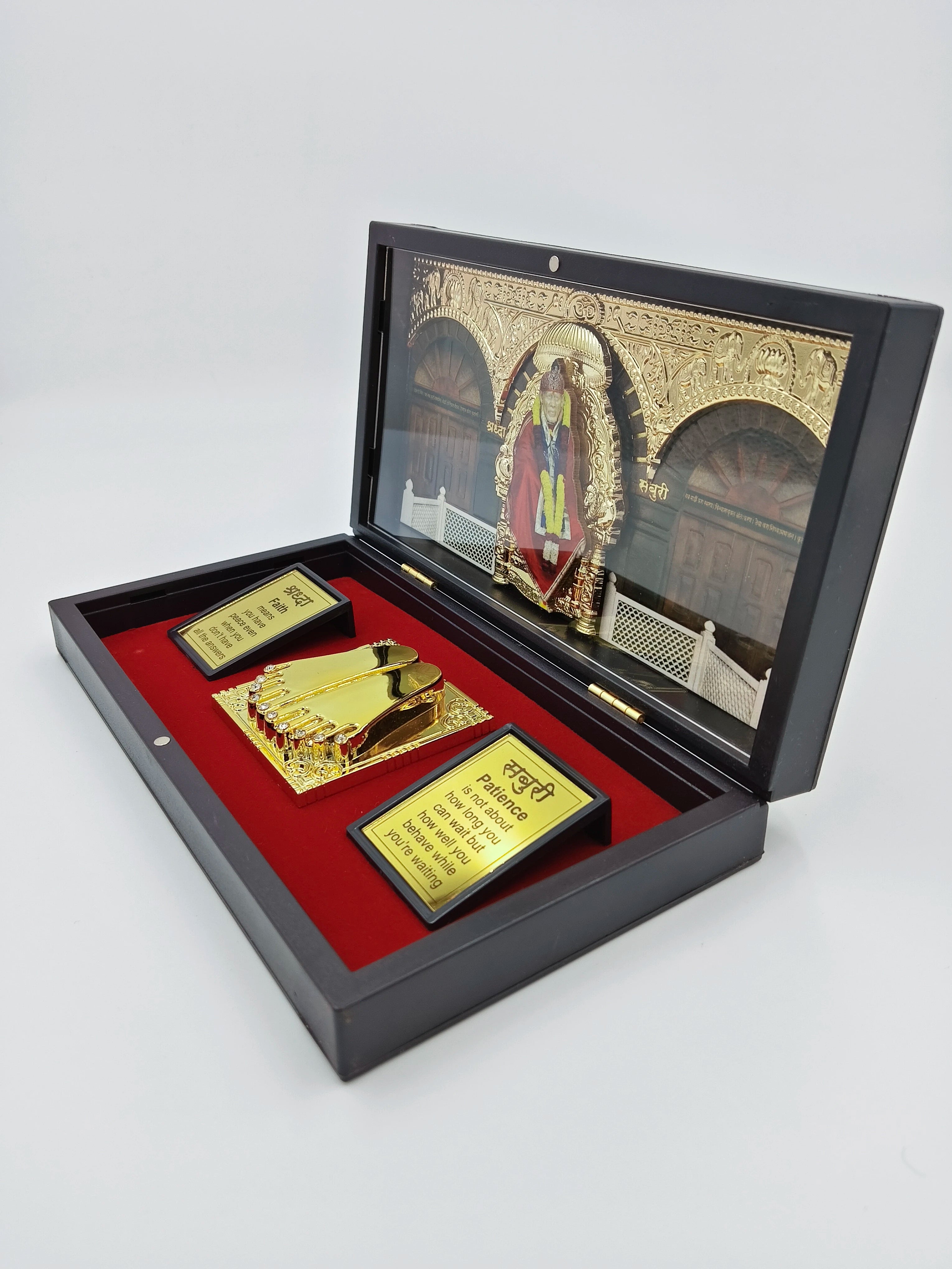 Open Sri Shirdi Sai Baba Paduka religious box with golden feet figurine and inspirational plaques