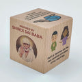 Small wooden cube with Shirdi Sai Baba image and inspirational quotes
