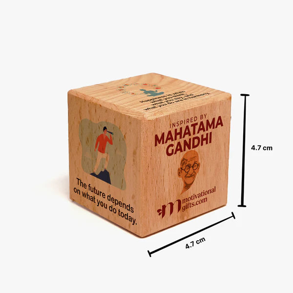 Inspirational wooden cube with Mahatma Gandhi quotes and illustrations