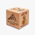 Inspirational wooden cube with Lao Tzu portrait and motivational quote