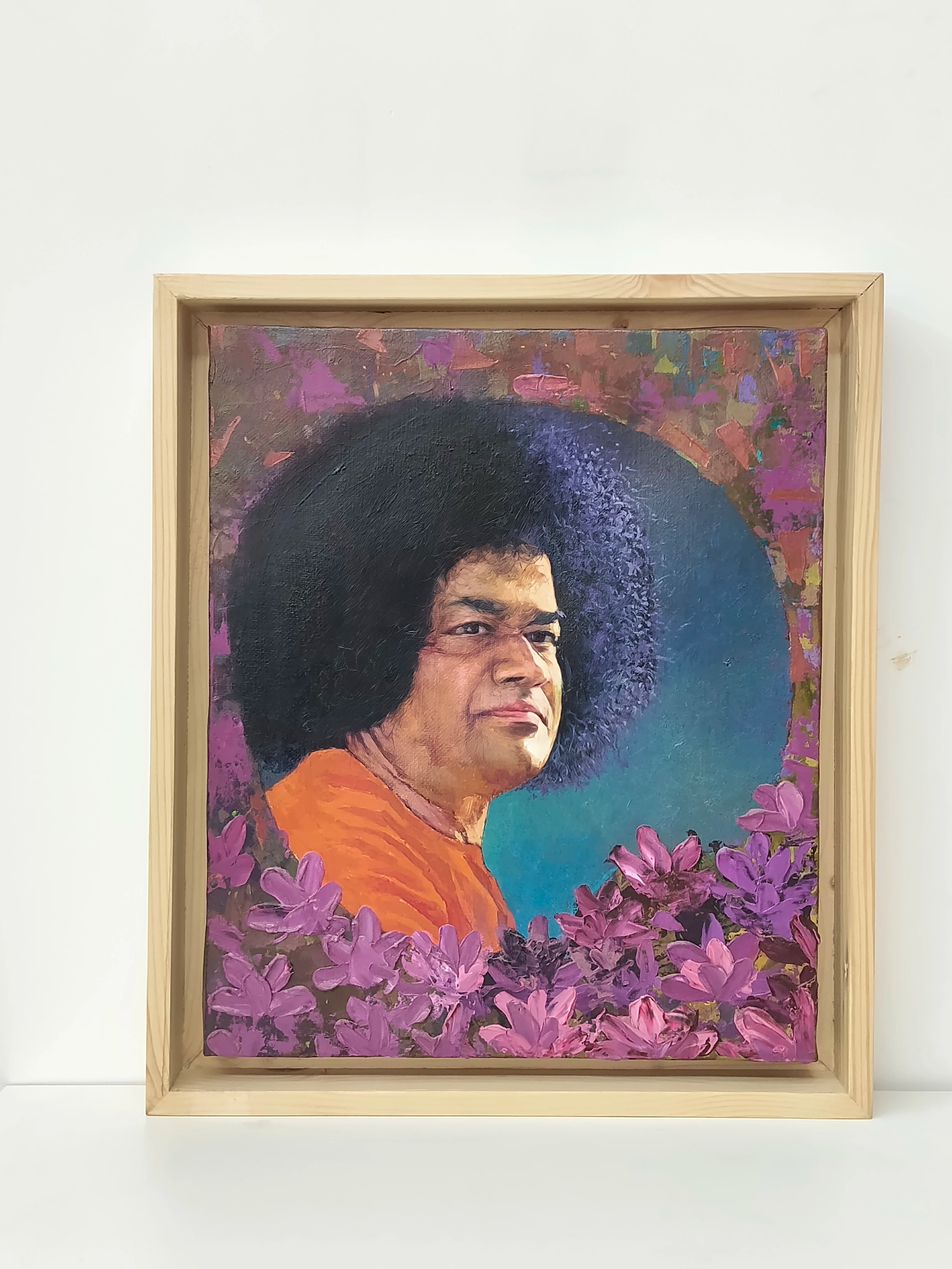 framed oil painting portrait of Sai Baba with purple flowers and colorful background