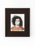 Framed painting portrait of Sai Baba with curly hair and orange robe