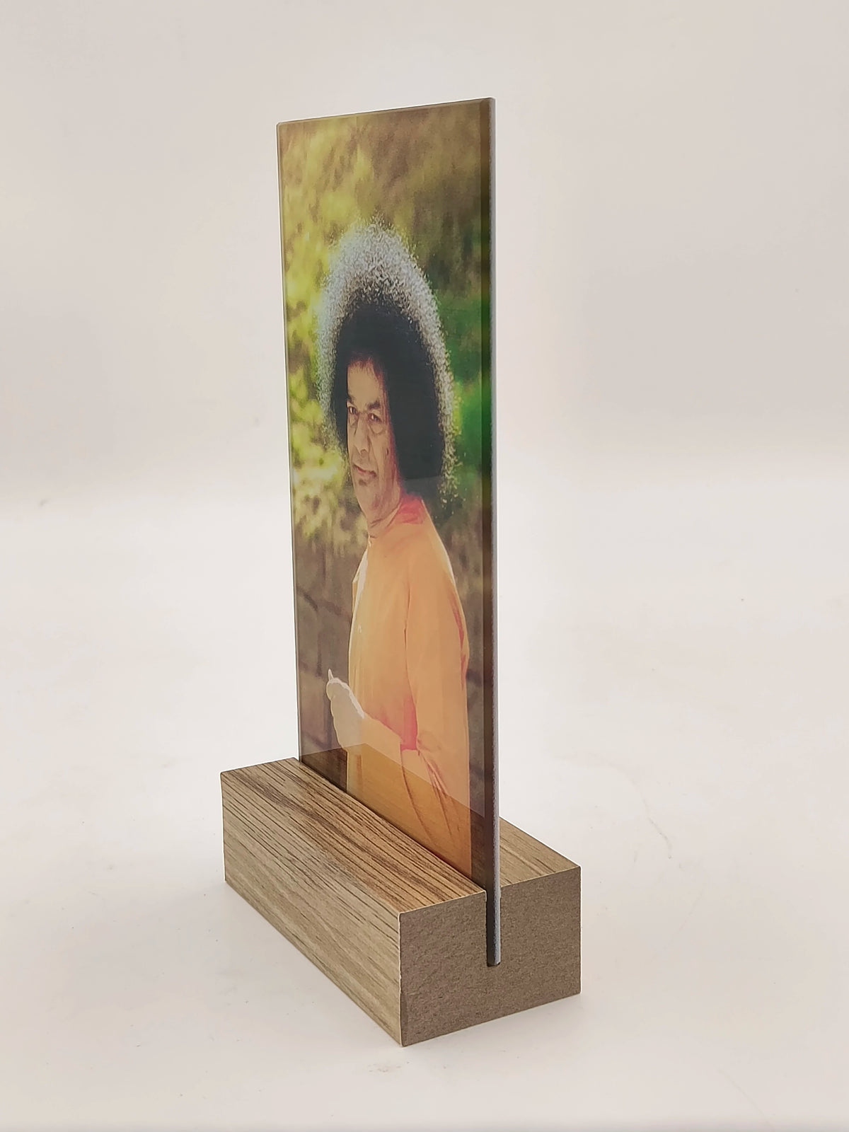 Glass panel with spiritual image set in wooden display stand