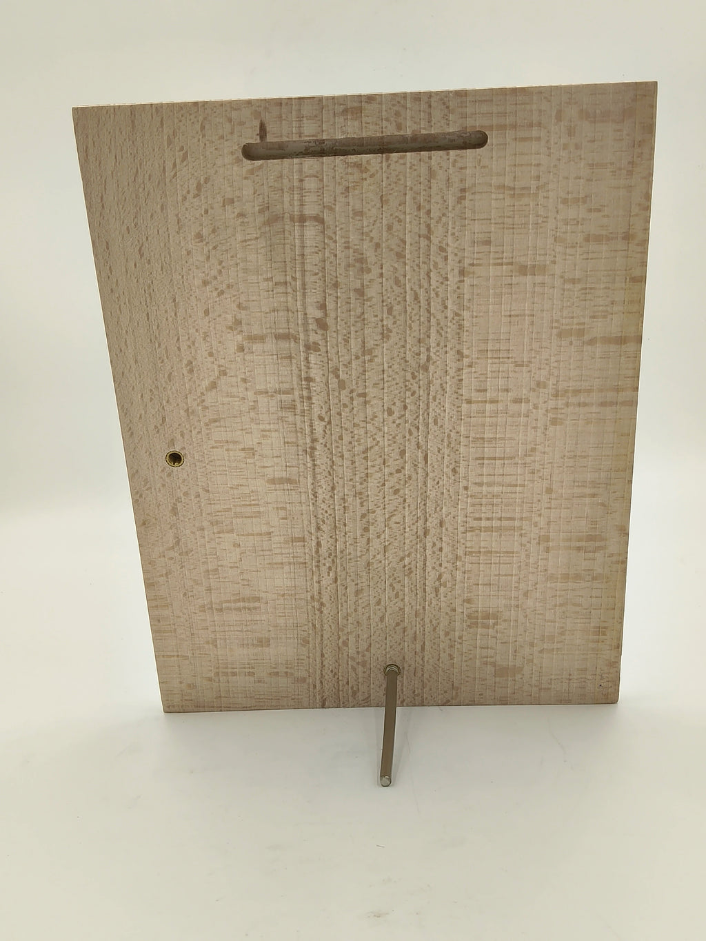 Back view of large rectangular wooden plaque with stand and hanging slot