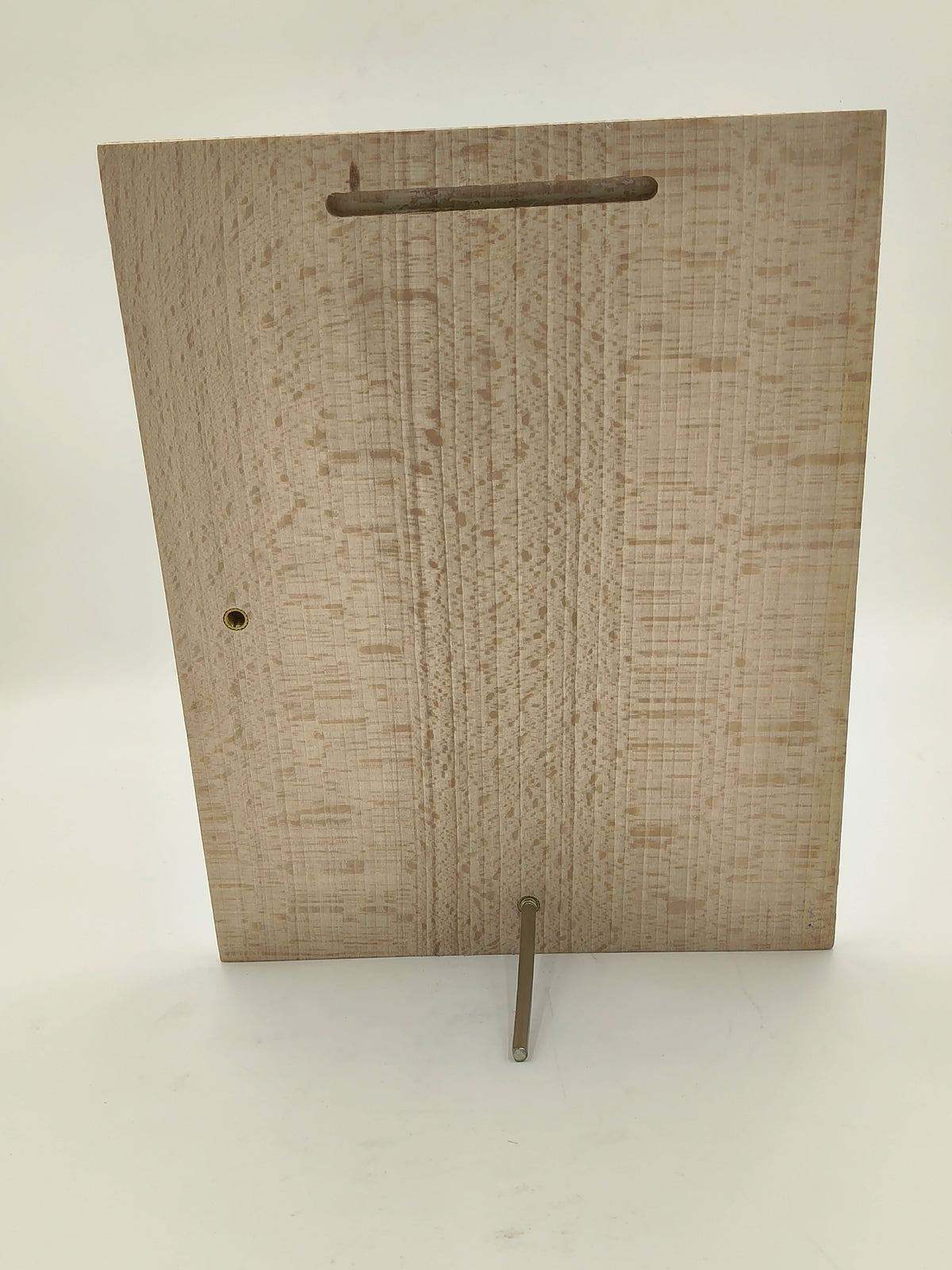 Back view of large rectangular wooden plaque with stand and hanging slot