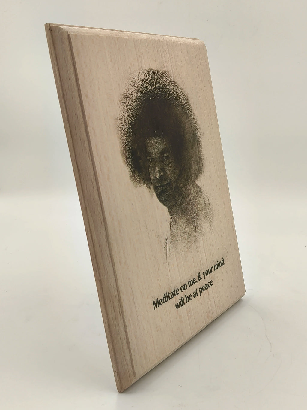 Large wooden plaque with engraved portrait and meditation quote