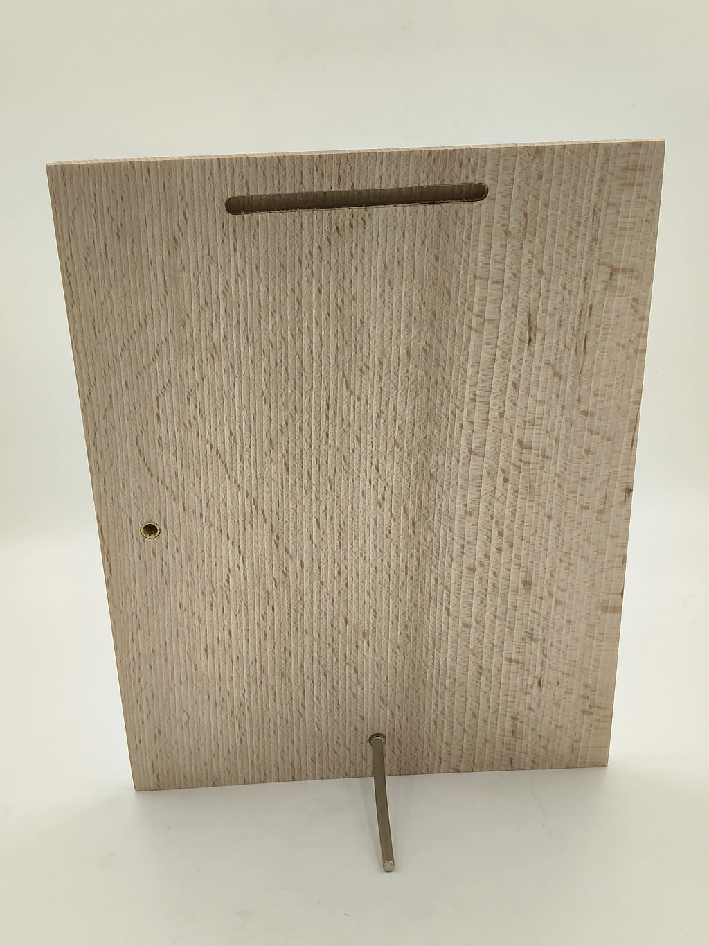 Back view of a large rectangular wooden plaque with a stand and hanging slot