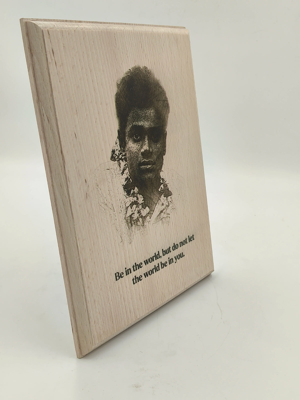 Large wooden plaque with engraved portrait and inspirational quote