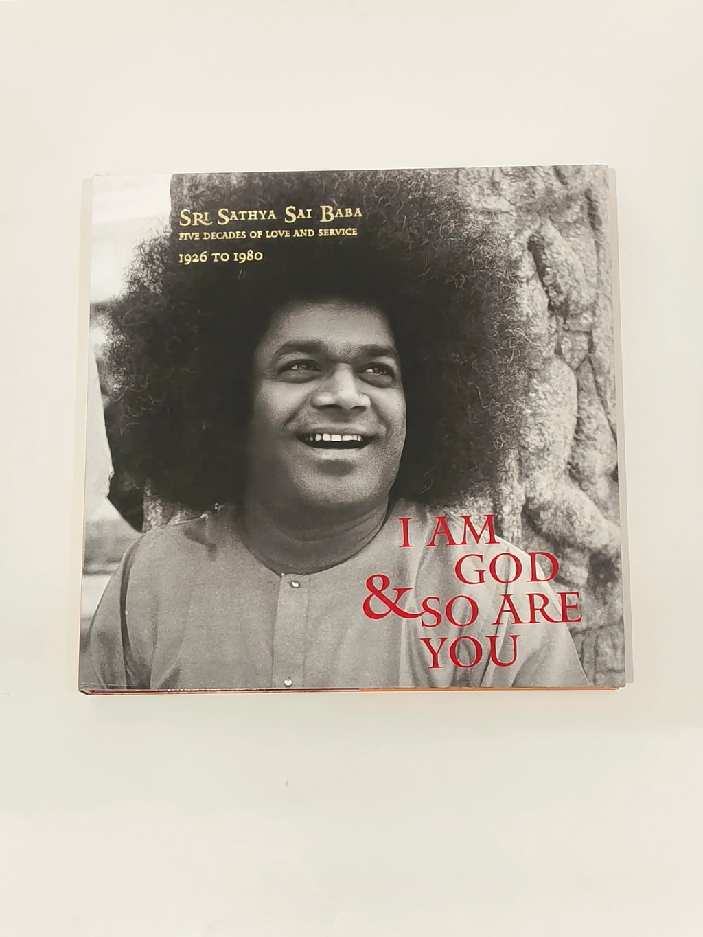 Hardbound spiritual book set titled I Am God & So Are You with image of Sathya Sai Baba